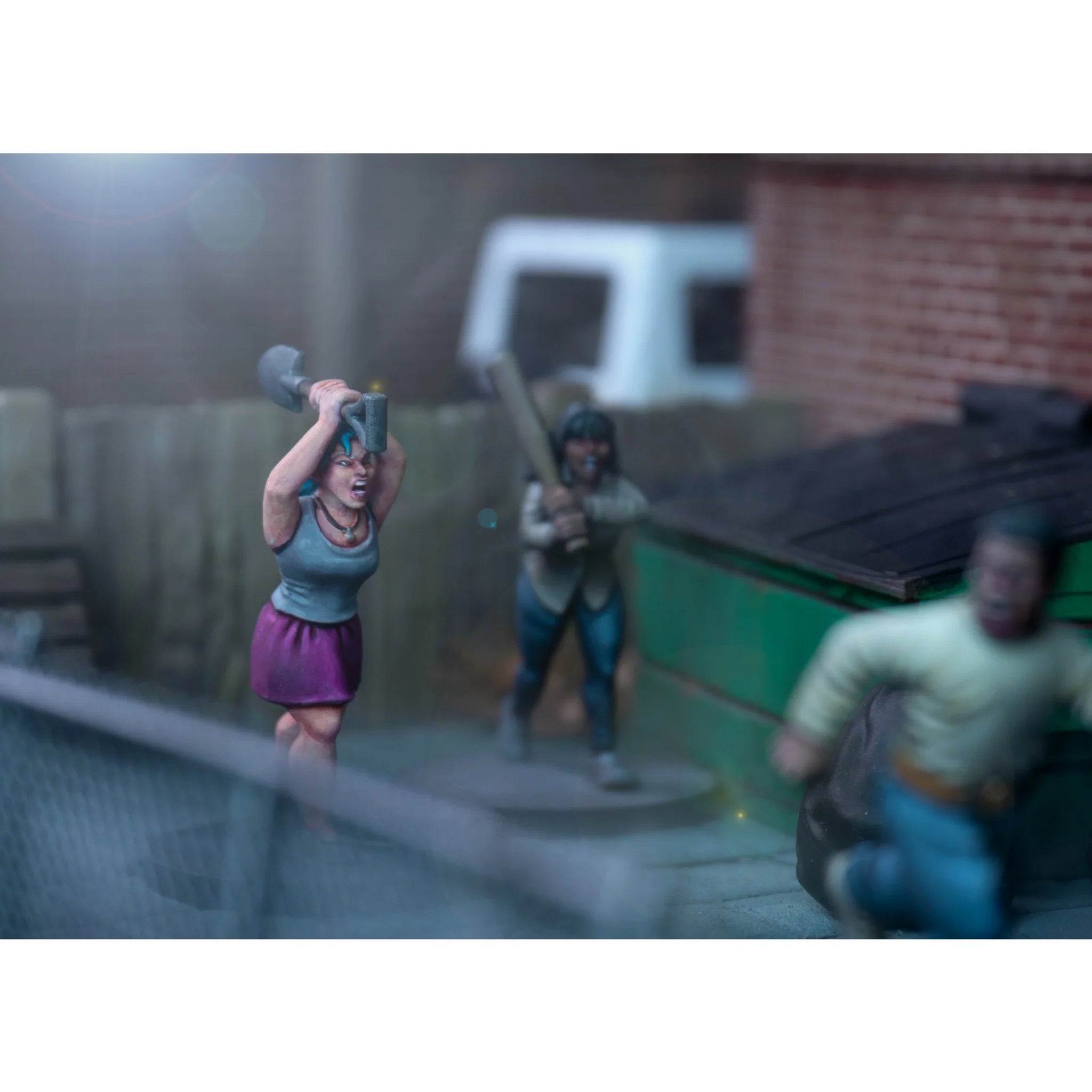Painted survivor figures wielding melee weapons while taking on a threat in a dirty back alleyway