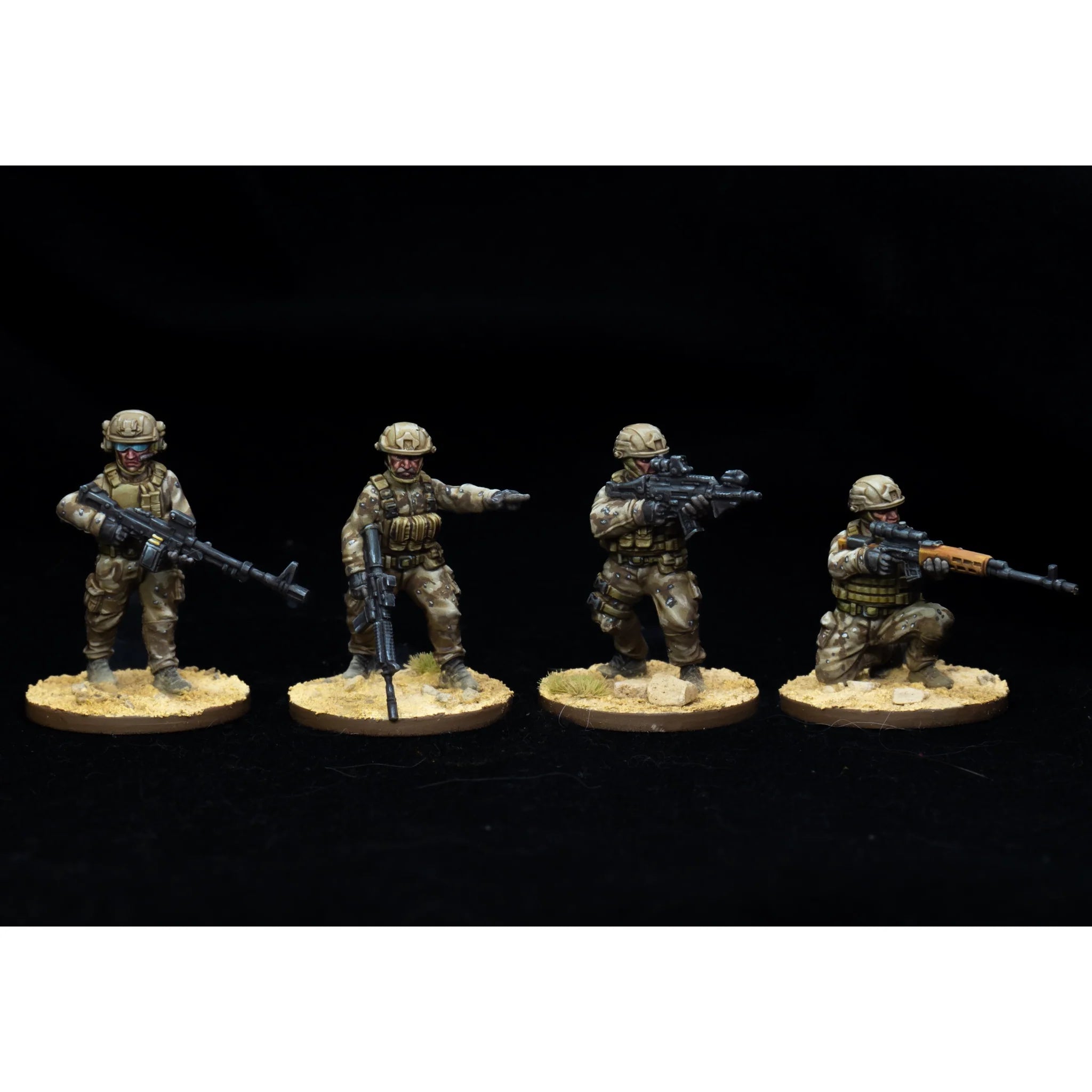 Assembled 28mm Operators in tactical poses with rifles and gear