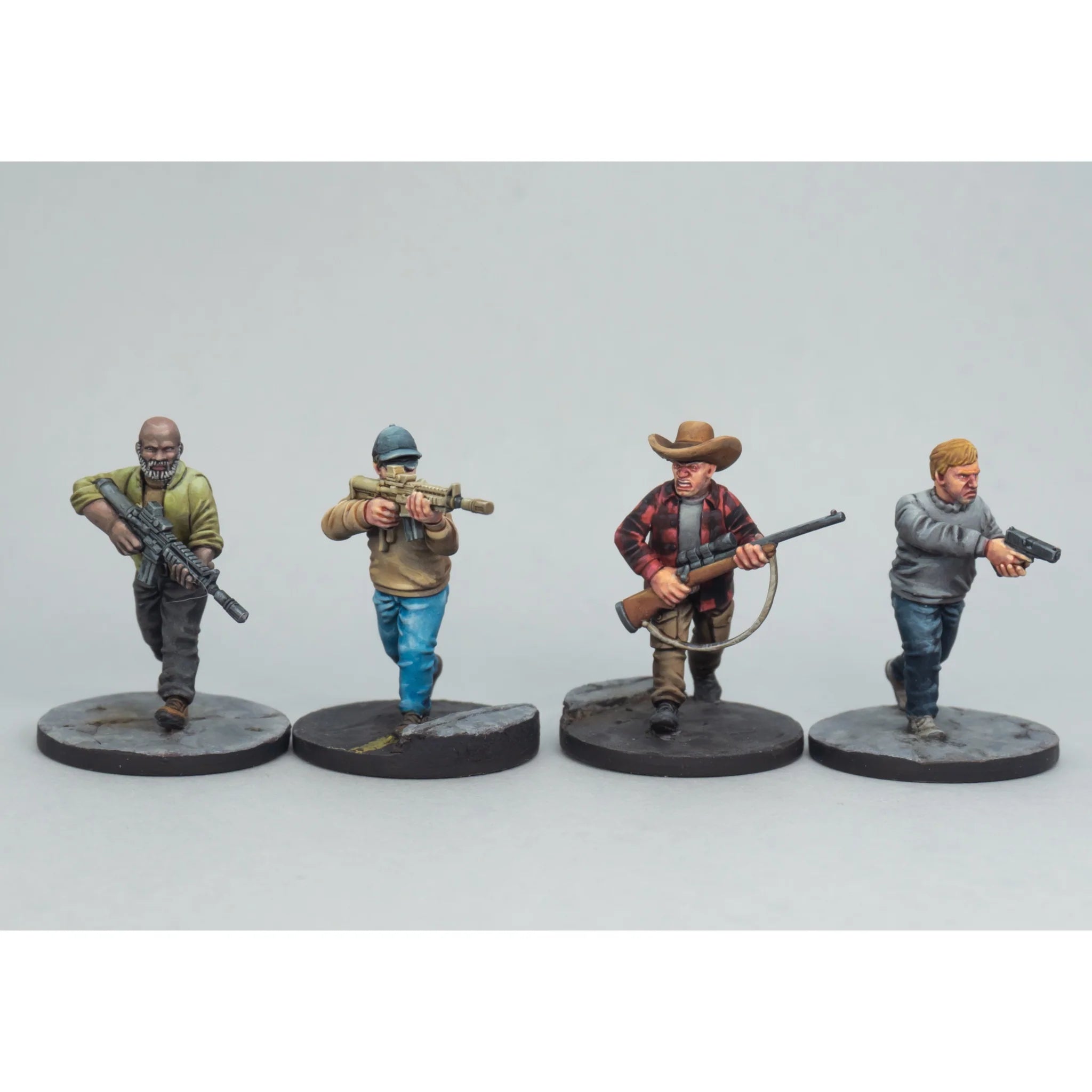 Four painted survivor models armed with an assault rifle submachine gun and scoped sniper rifle