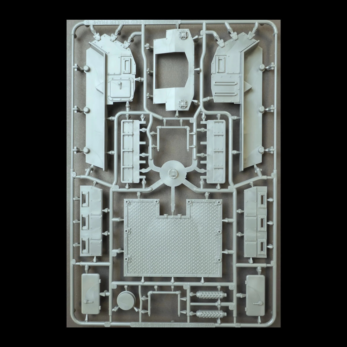 Front perspective of the hard plastic Damned Mauler vehicle sprue showing panels and flatbed