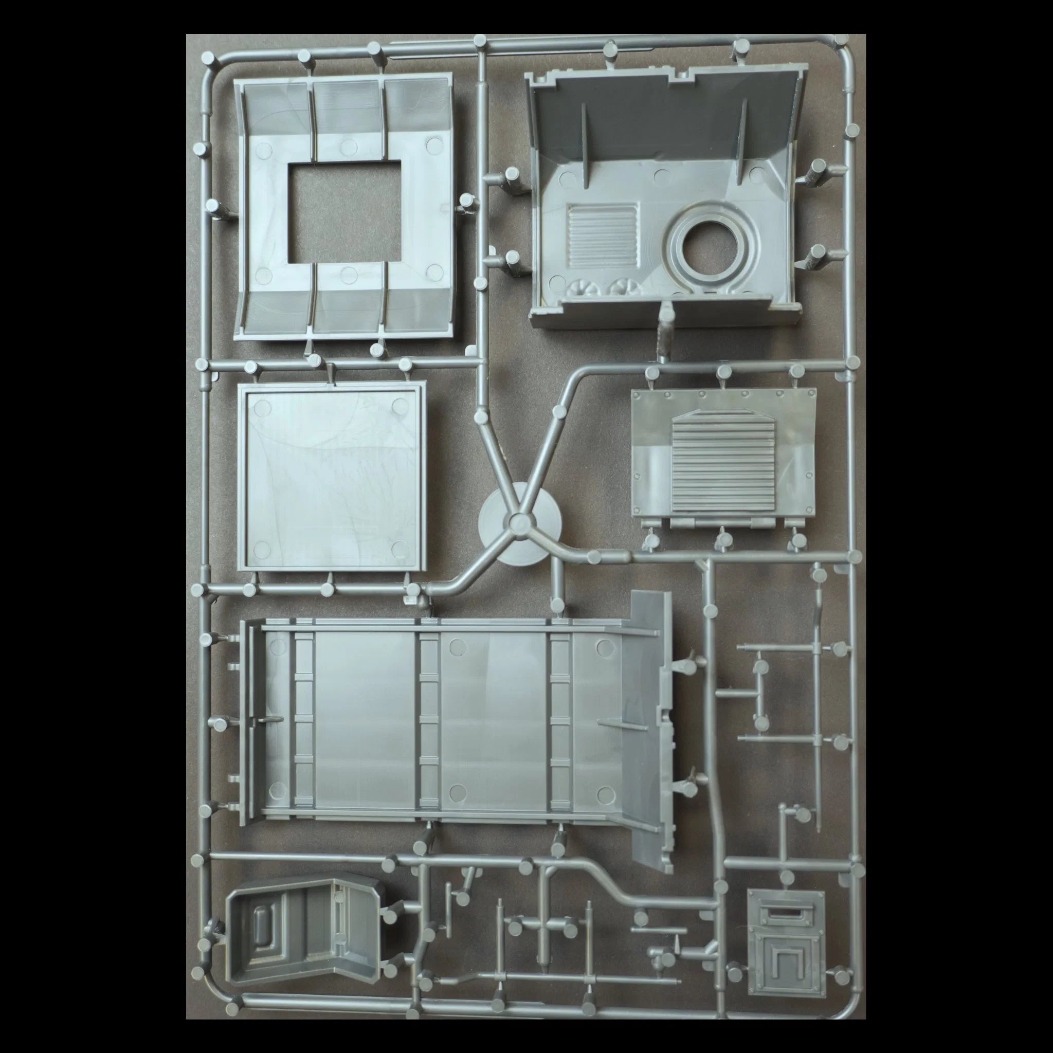 Reverse side of sprue frame B showing interior structural sections for the Damned Mauler armored vehicle