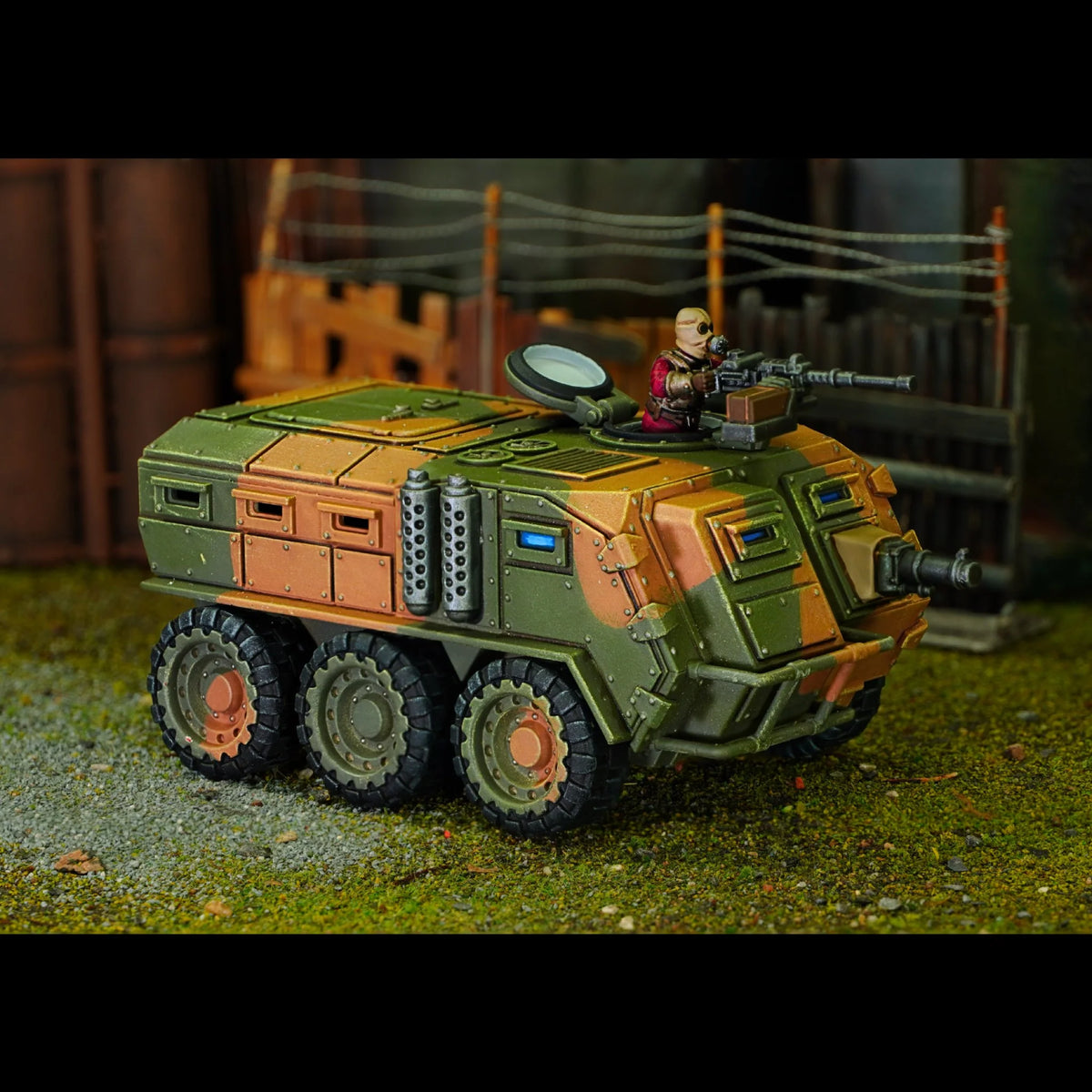 Side perspective of a painted Damned Mauler enclosed armored troop transport with turret gunner