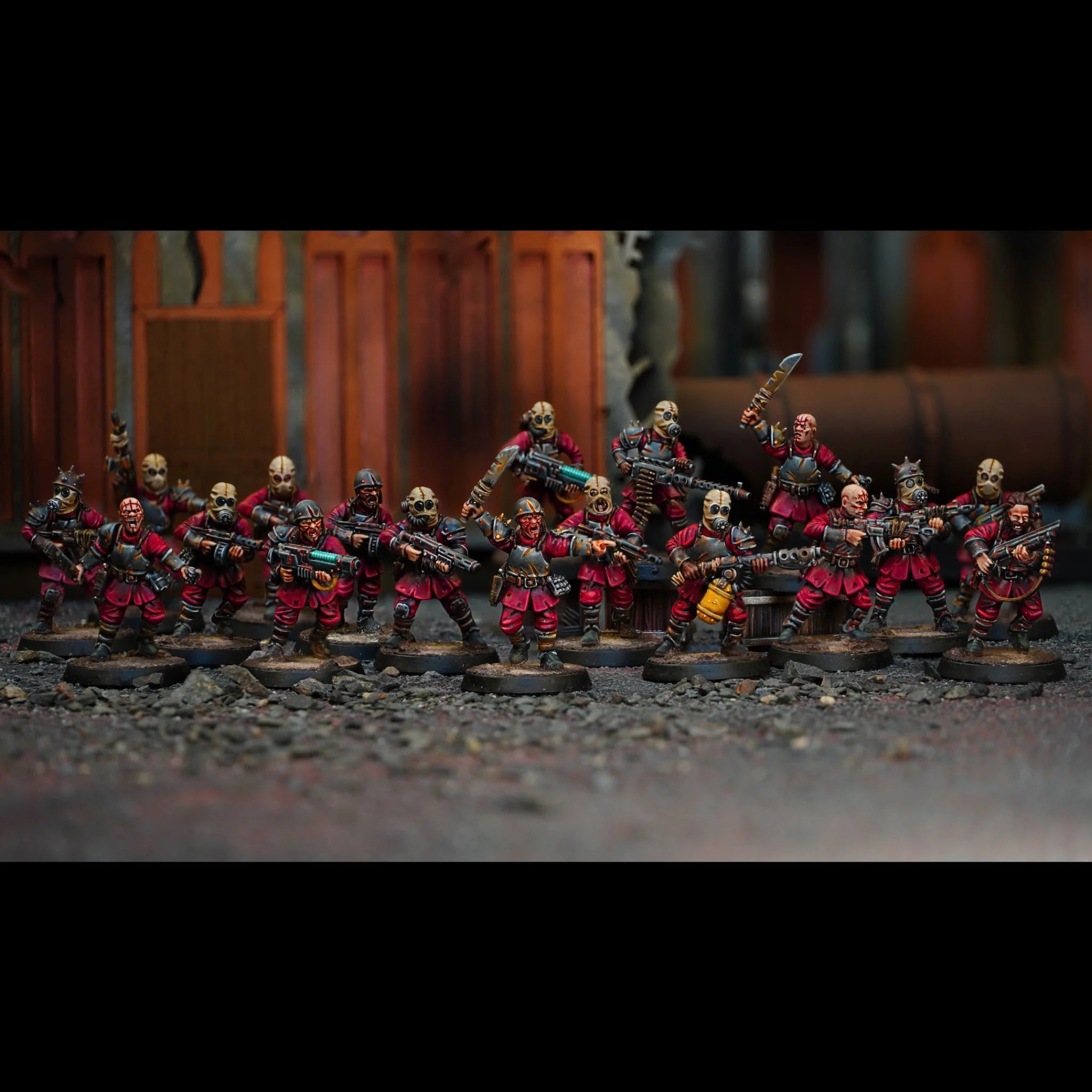 Squad of painted male Damned infantry figures advancing with rifles and gas masks