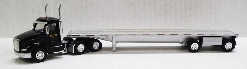 Peterbilt 579 Day Cab (Black) TMC Logo W/ Spread Axle Flatbed, 1:87 (HO) Scale Model By Trucks N Stuff