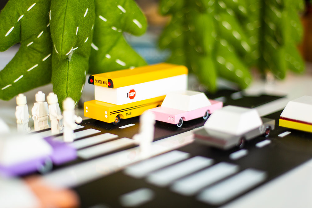 Candylab Toys School Bus Wooden Vehicle – In Play Scene with Cars and Trees