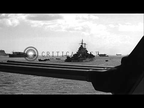 USS Pittsburgh (CA-72) enters harbor after being damaged by a typhoon