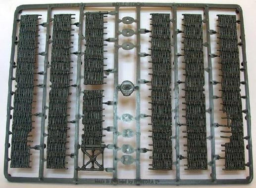 Gray hard plastic sprue frame for the Renedra Wattle Fencing kit showing multiple woven fence sections and an integrated gate