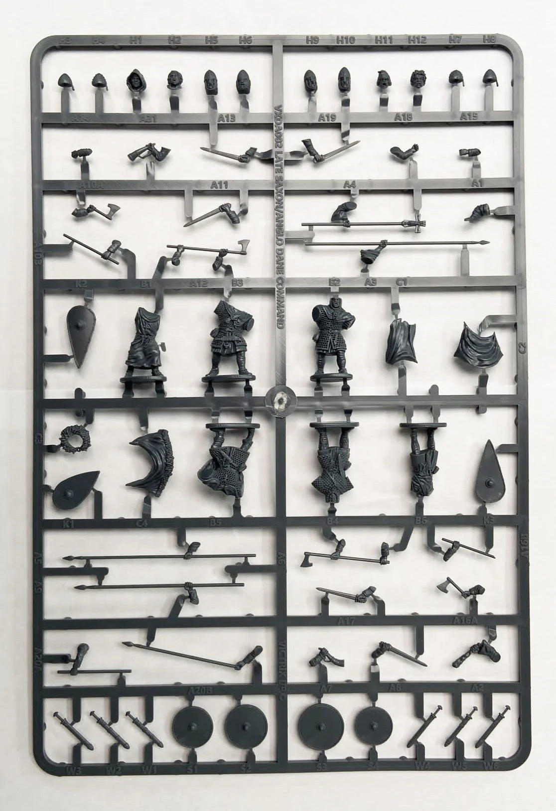 Detailed gray plastic sprue layout for Victrix 28mm Late Saxon command figures and weapons