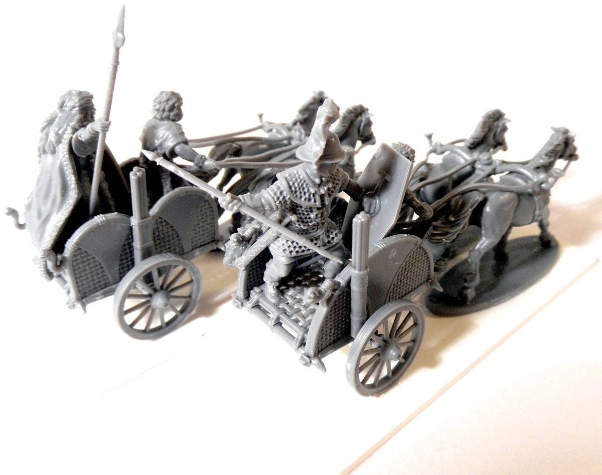 Elevated three-quarter view of unpainted gray plastic Victrix 28mm Celtic chariots with javelin crew