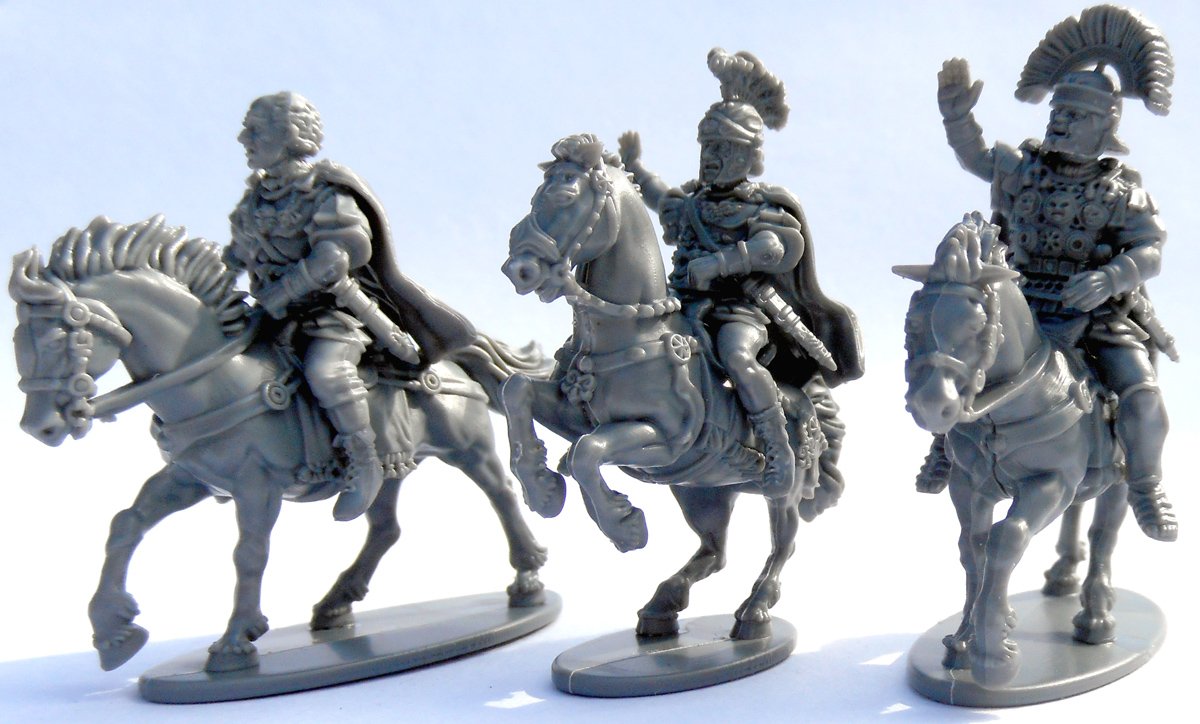 Early Imperial Roman Generals, Three unpainted gray plastic Victrix 28mm Roman mounted officers viewed from a three-quarter angle