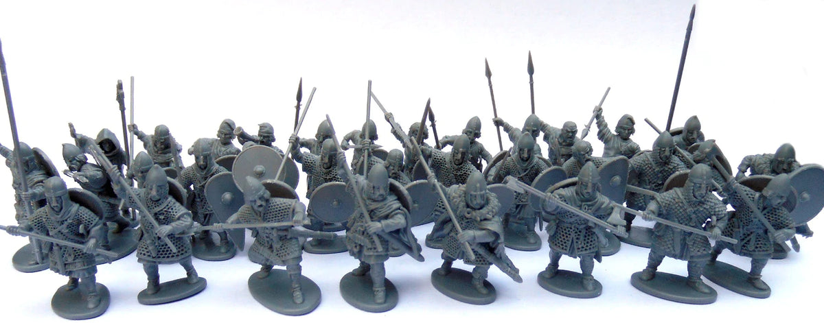 Assembled unpainted gray plastic Victrix 28mm Late Saxon infantry forming a dense battle line